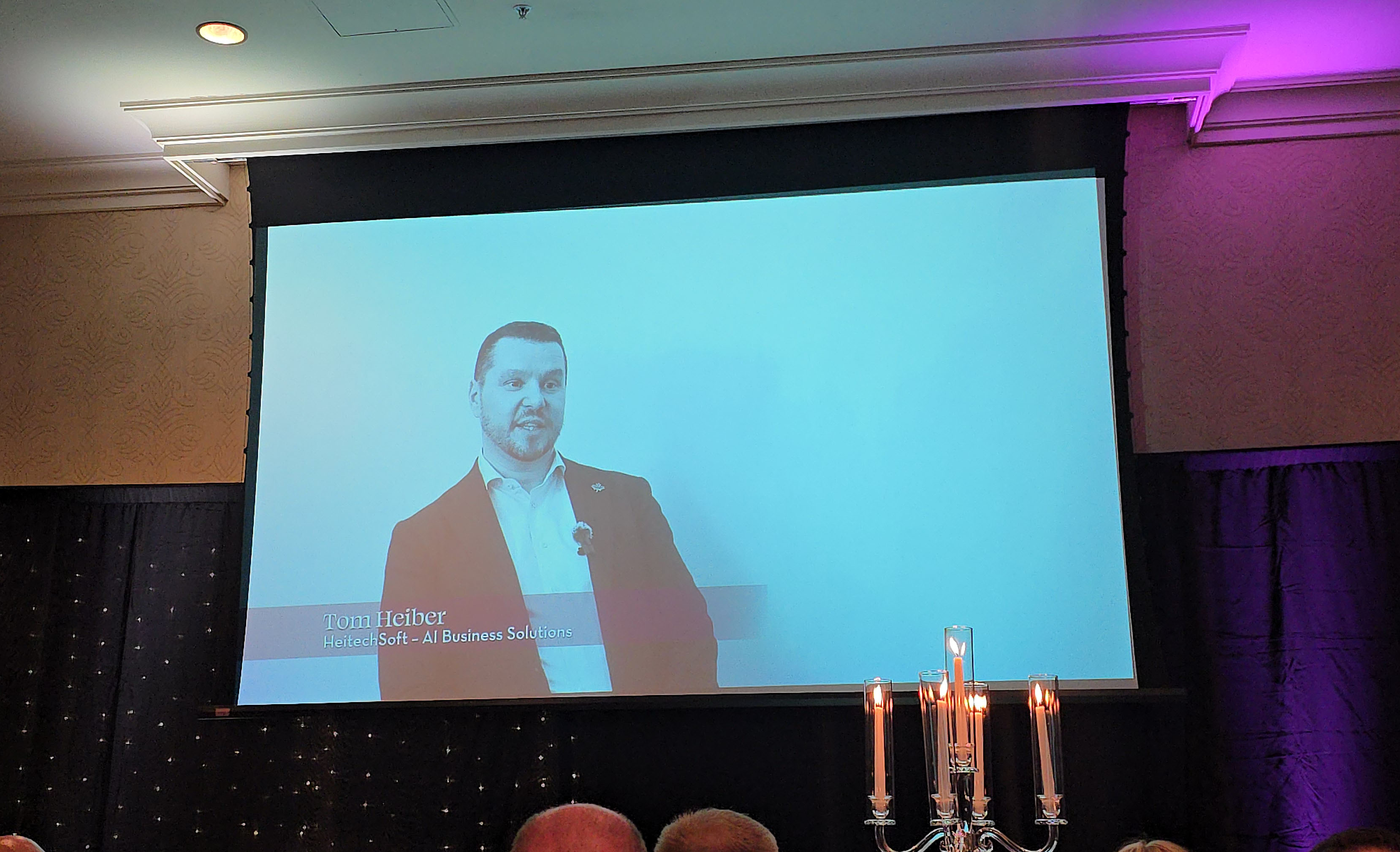 HeitechSoft award nomination video displayed on a large screen during the Guelph Awards of Excellence ceremony